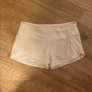 White lululemon workout shorts.